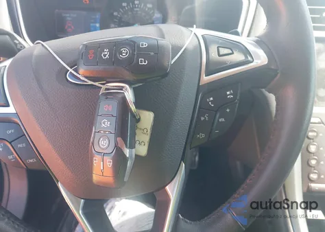 2016 Ford Fusion Titanium z USA, uszkodzony, nr VIN 3FA6P0K93GR231217